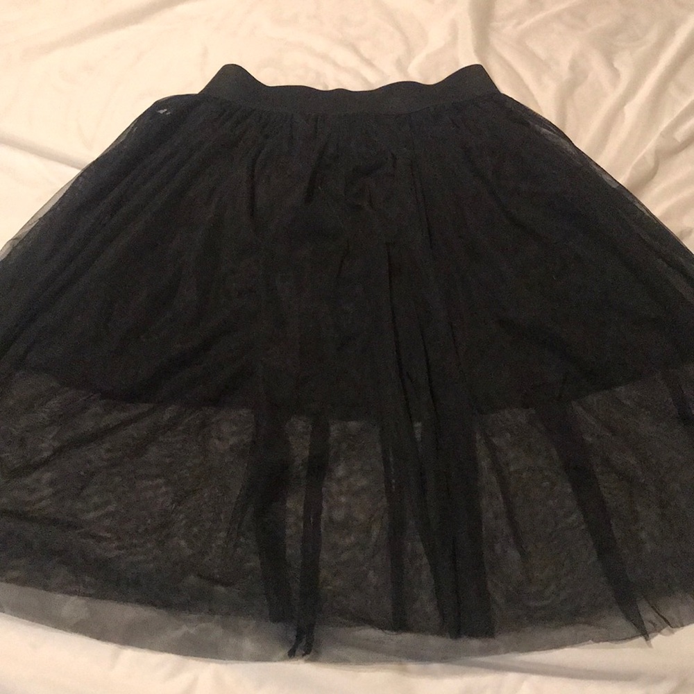 Adorable skirt with a sheer layer